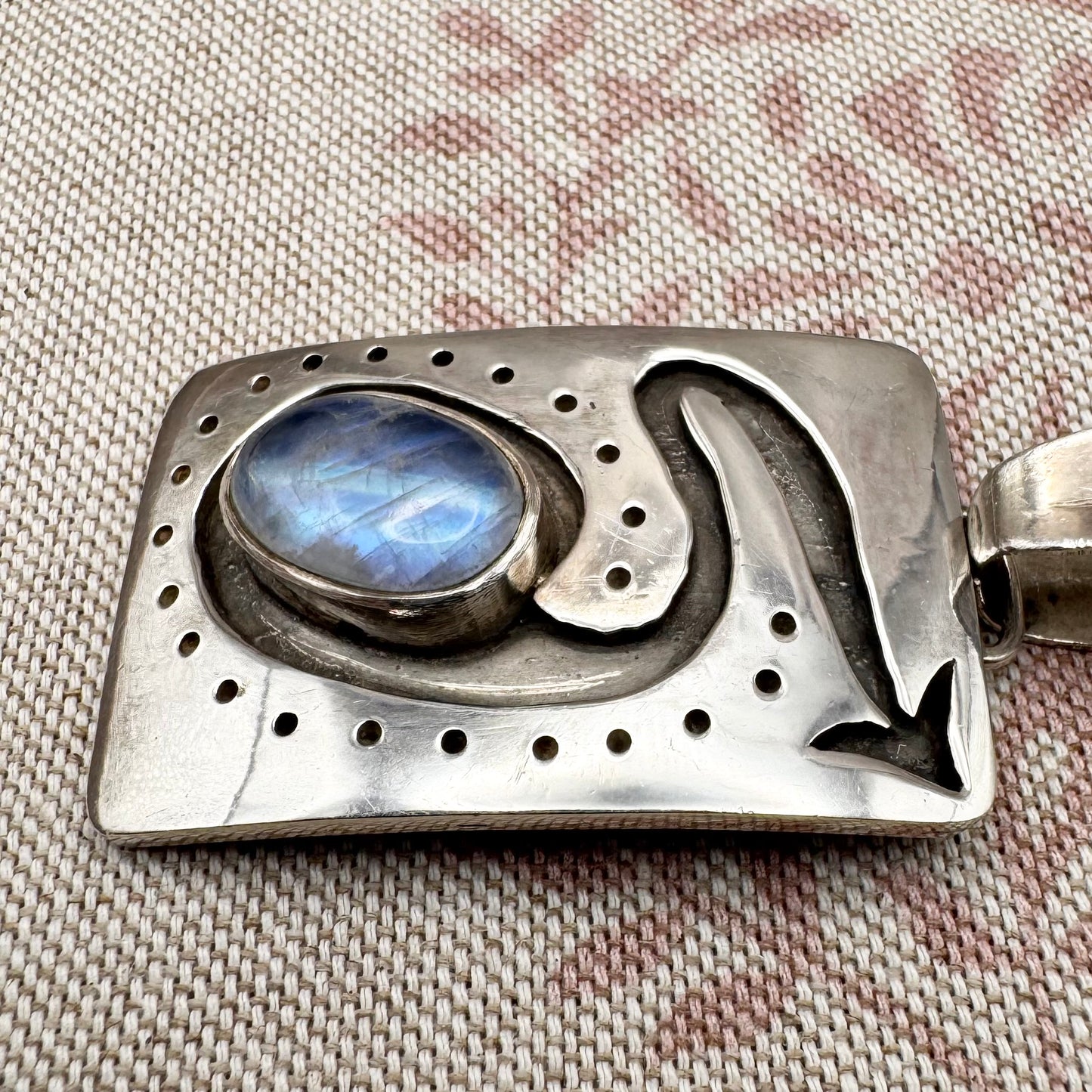 Large silver moonstone pendant with abstract arrow motif