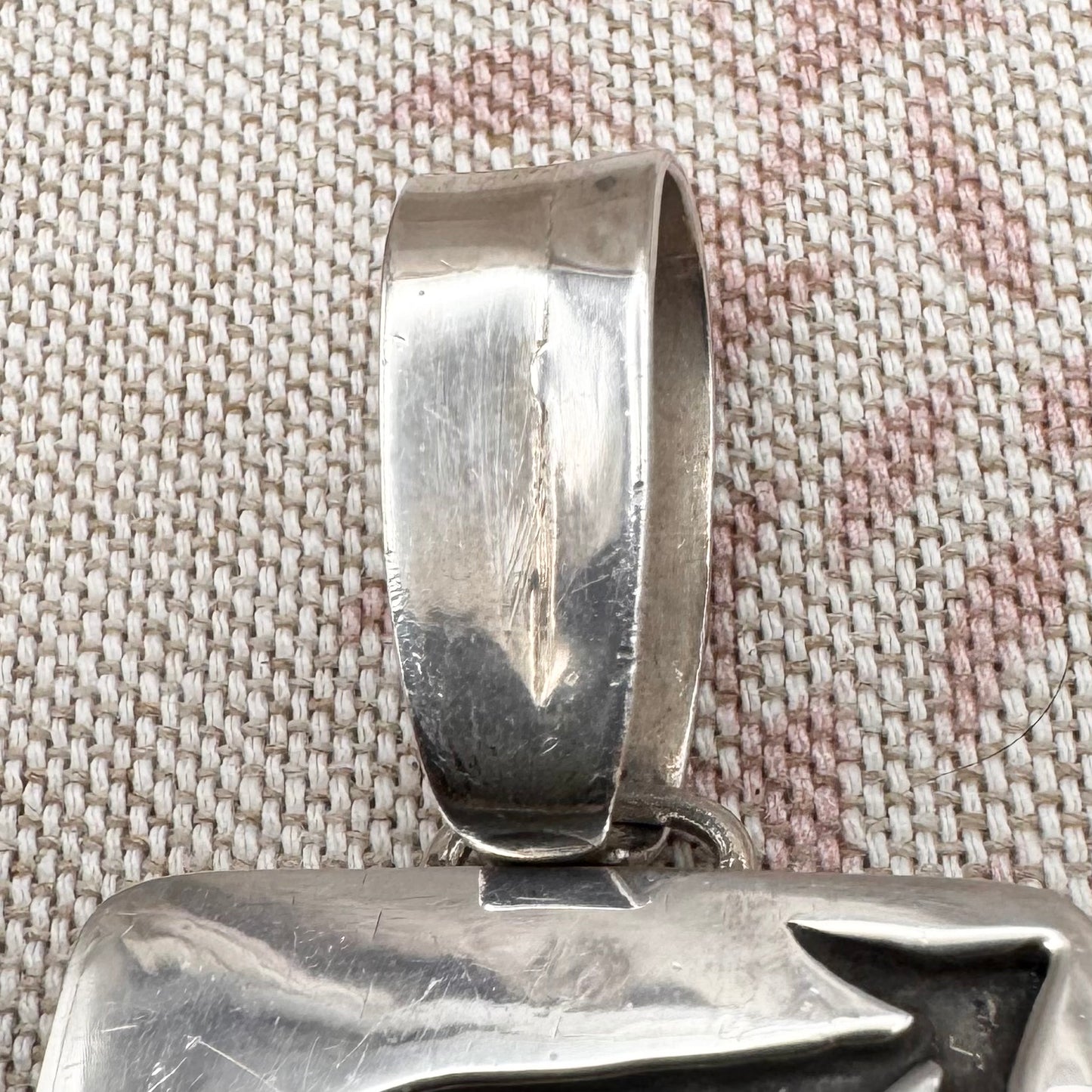 Large silver moonstone pendant with abstract arrow motif