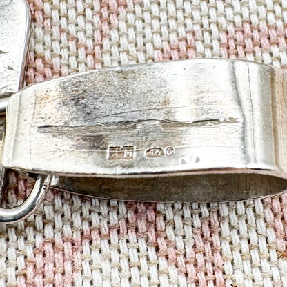 Large silver moonstone pendant with abstract arrow motif