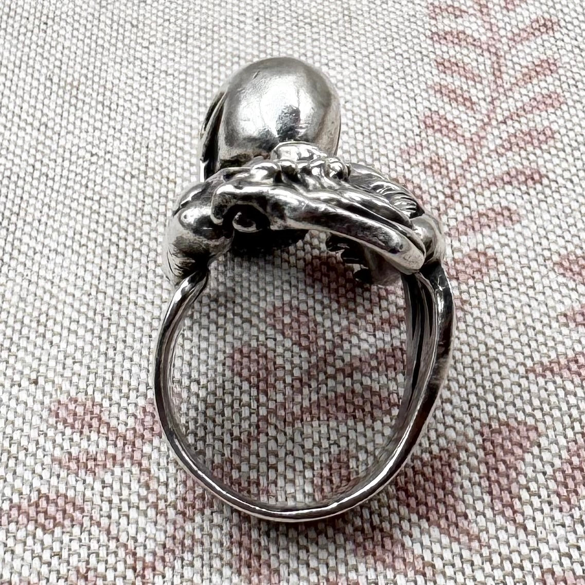 Skeleton ring with internal spine detail, size R (US 8.5) adjustable, hallmarked Birmingham