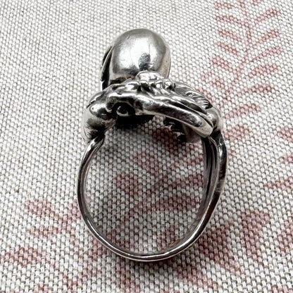 Skeleton ring with internal spine detail, size R (US 8.5) adjustable, hallmarked Birmingham