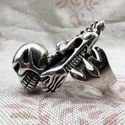 Skeleton ring with internal spine detail, size R (US 8.5) adjustable, hallmarked Birmingham