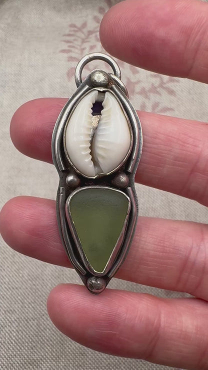 Sea glass & cowrie shell pendant by Smugglers Treasures, hallmarked Sheffield