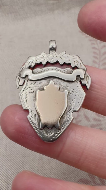 Antique unengraved silver medal fob, hallmarked Chester 1905