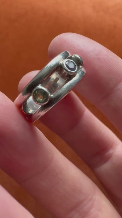 Silver multi-stone ring with open band design, size O.5 (US 7.5)