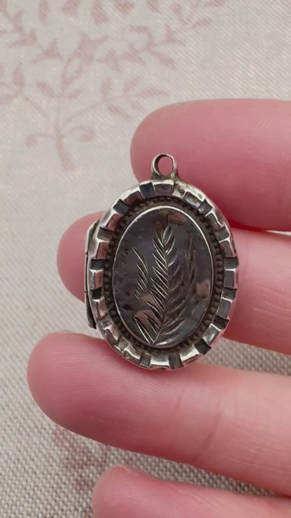 Victorian silver locket with engraved fern design, hallmarked Birmingham 1885