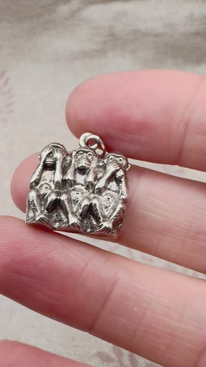 Vintage 'Three Wise Monkeys' silver pendant