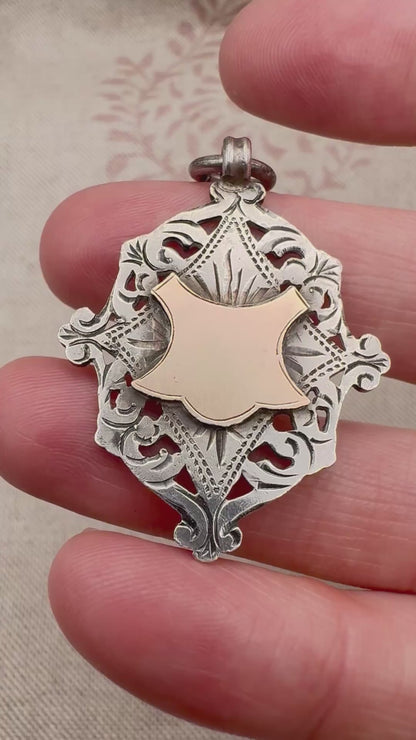 Antique Edwardian sterling silver and gilt medal fob pendant, hallmarked Birmingham 1909