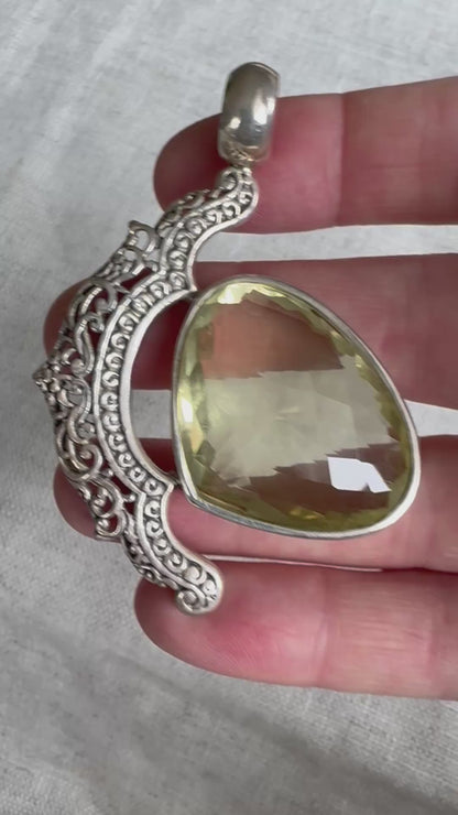 Citrine statement pendant with ornate openwork design