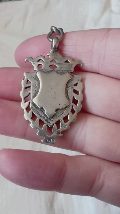 Edwardian silver medallion keyring with historic coin charms, hallmarked Birmingham 1906