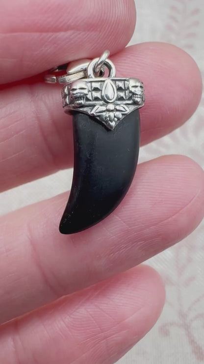Thomas Sabo sterling silver tooth charm with skull detail