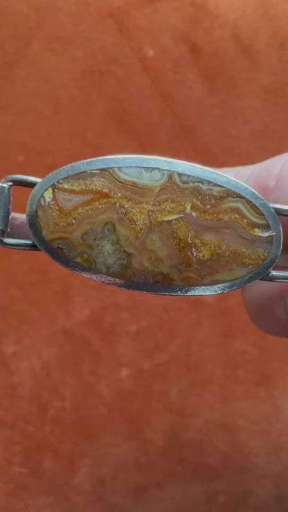 Silver banded agate bangle, hallmarked Sheffield 1978