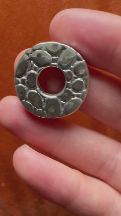 Textured silver pebble pendant