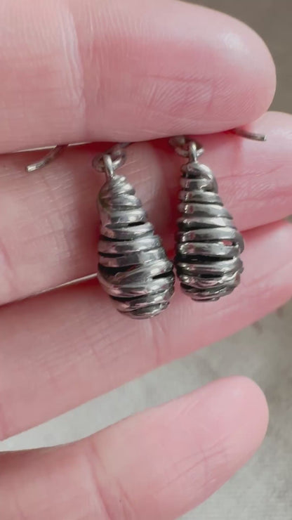 Silver spiral drop earrings with sculptural organic form