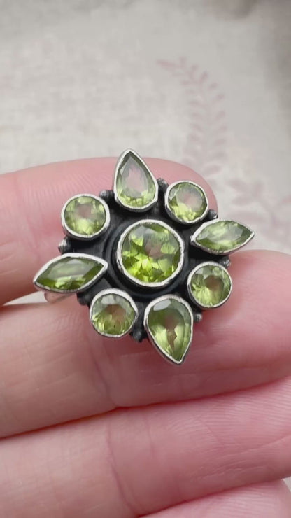 Silver peridot cluster ring, size R.5 (US 9)
